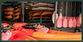 Oars and canoes in shed