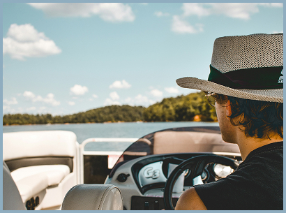 man driving boat